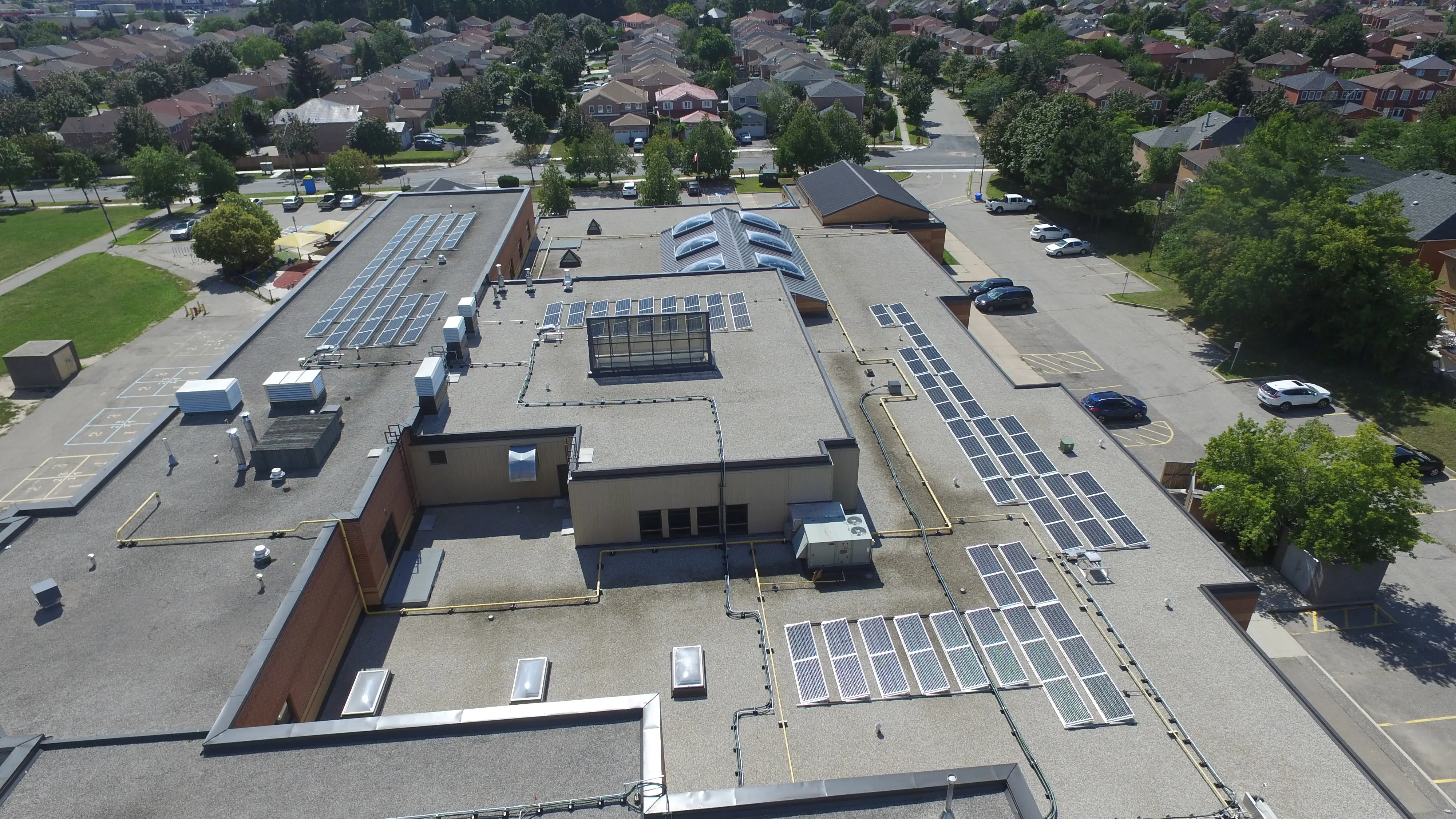 Solar panels installatio project at Champlain School complete by Triumph Group of Companies