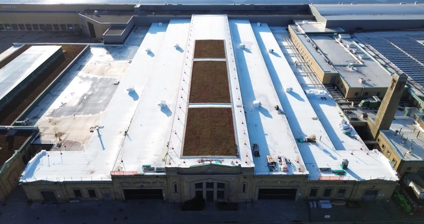 roof replacement, sheet metal works, sing ply roof system industry building project by Triumph Group of Companies