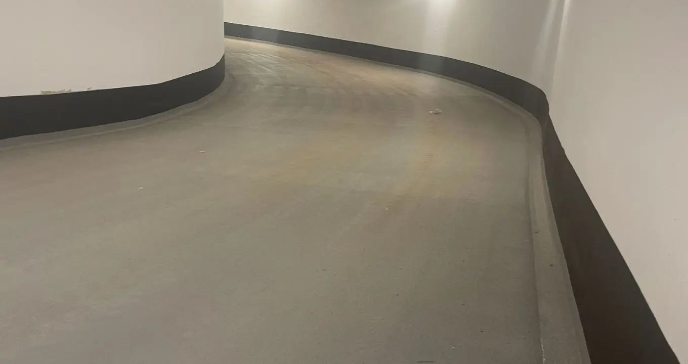 Traffic topping applied to the indoor parking garage at Kiwi Condos in Toronto, completed by Triumph Group of Companies.